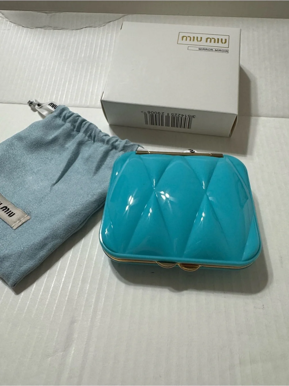 Miu Miu glossy quilted